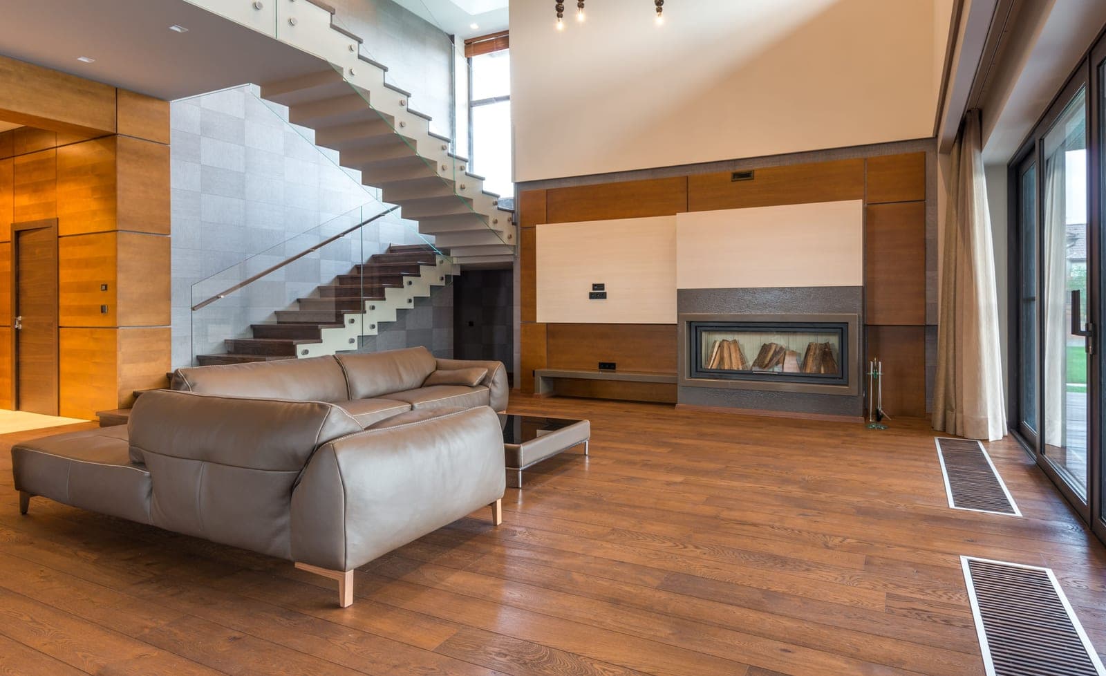A minimal living room with a hardwood floor