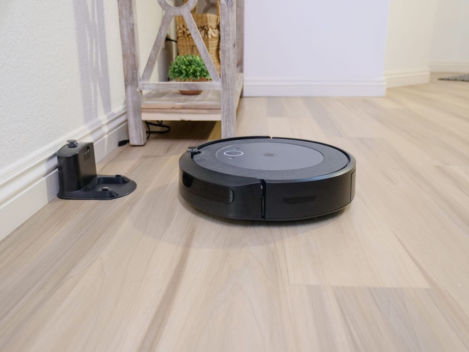 A robot vacuum at its charging dock
