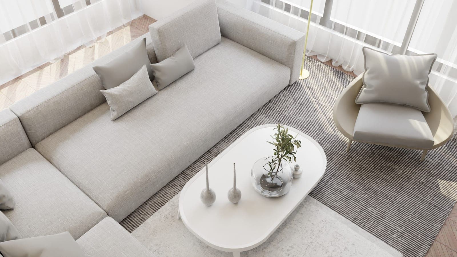 A living room with a rug and wooden floor